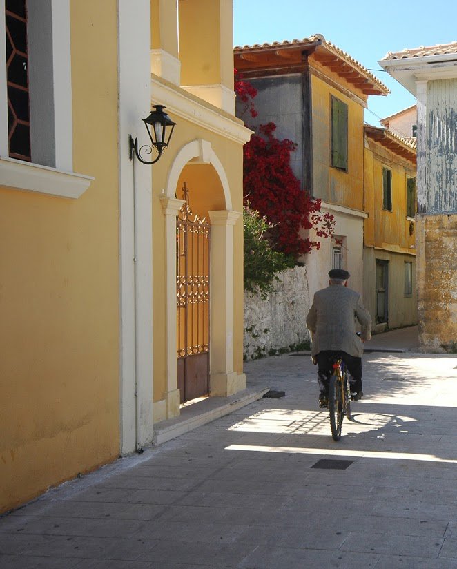 Cycling through the streets of Lefkada Town @Andreas Thermos